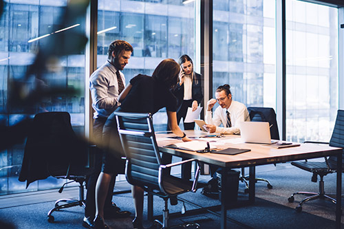 cooperation-process-professional-male-female-colleaguesbusiness