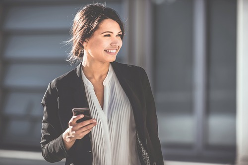 woman holding a phone